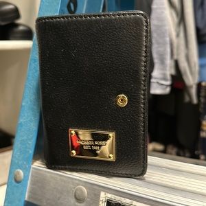 Michael Kors black passport holder